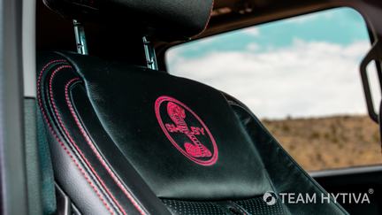 Red Stitching and Embroidery on Leather Passenger Seat