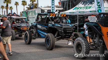 UTV Turbo Class UTV's in Front of Team Hytiva Booth