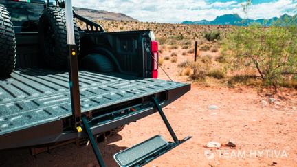 Shelby Super Baja Tailgate Step and Grab Bar in Locked Position.