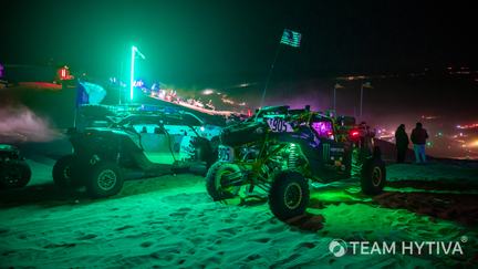 Neon lights illuminate Glamis at night