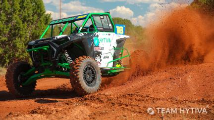 Team Hytiva RZR Kicking Up Red Dirt