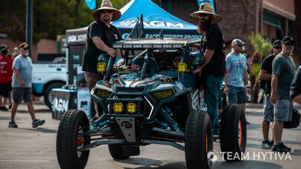 UTV with Crew Catching a Lift